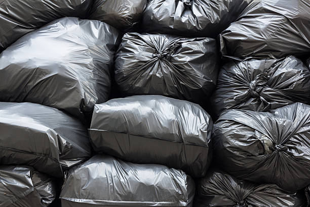 istock pile of black garbage bags 504430124
