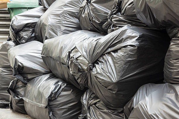 istock pile of black garbage bags 504430196