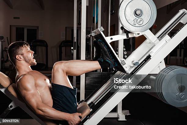 Muscular Man Doing Heavy Exercise Stock Photo - Download Image Now - Active Lifestyle, Adult, Adults Only