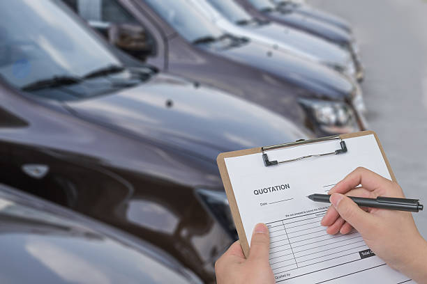 istock filling in a quote form for car 504431360