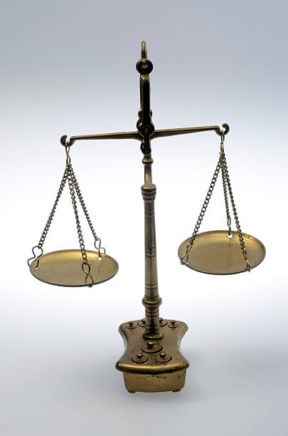 istock Golden weighing scale 504447118