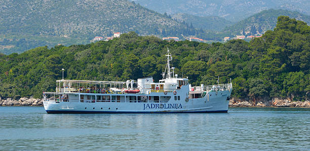 The Elaphite Island ferry Donje Celo, Kolocep, Croatia - June 17, 2013: The Elaphite Island ferry docking at Donje Celo on the Island of Kolocep. The ferry sail out of Dubrovnik to the islands of Kolocep, Lopud and Sipan. dubrovnik lopud stock pictures, royalty-free photos & images