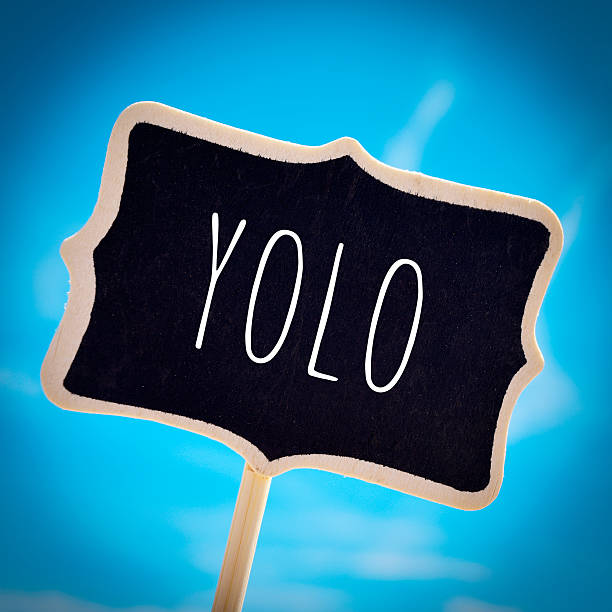 signboard with the word yolo, vignetted