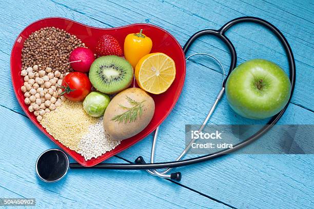 Food On Heart Plate With Stethoscope Stock Photo - Download Image Now - Cholesterol, Lowering, Dieting