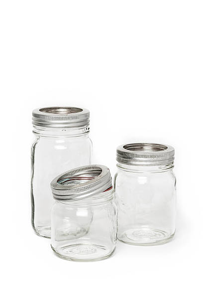 trois verre vide pot - preserves jar empty red photos et images de collection