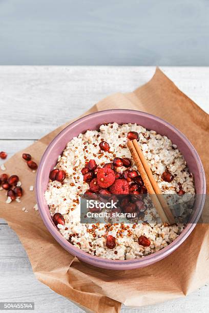 Porridge With Quinoa And Pommegranate Stock Photo - Download Image Now - Almond, Bowl, Breakfast