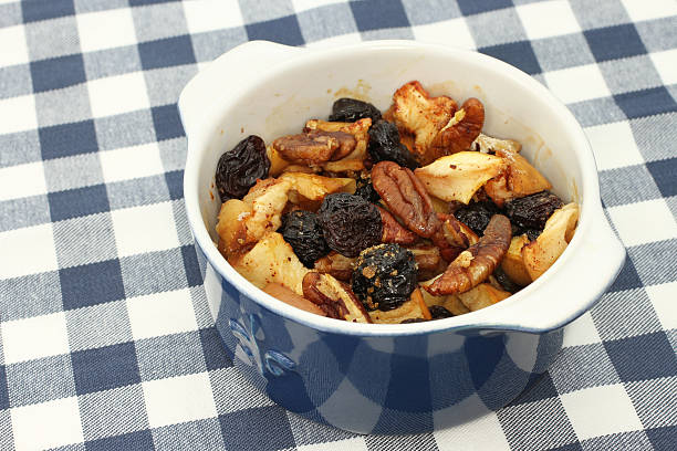 istock Apple crumble baked pudding with raisin, pecan nuts and honey 504456802