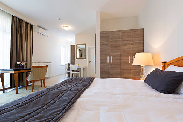 istock Interior of a double bed hotel room 504459040
