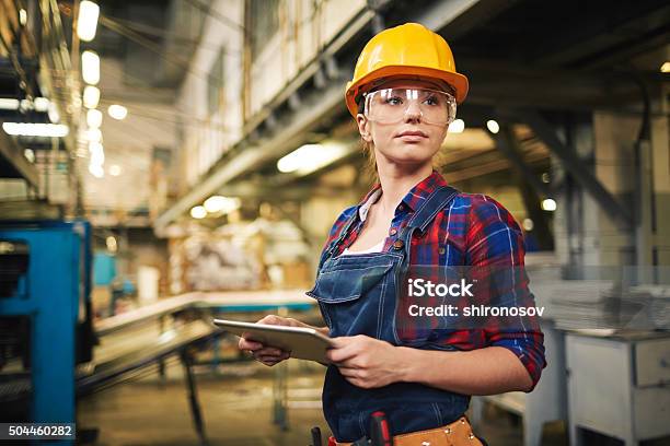 Factory Female Worker Stock Photo - Download Image Now - Protective Eyewear, Engineer, Industry