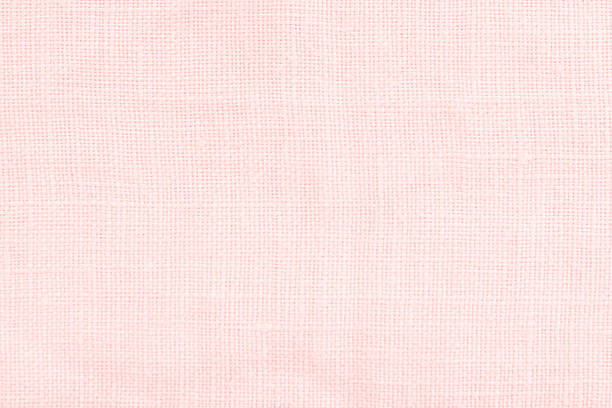 istock pink linen surface - close up of pastel textile background 504477730