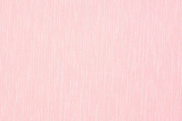 pink linen surface - close up of pastel textile background
