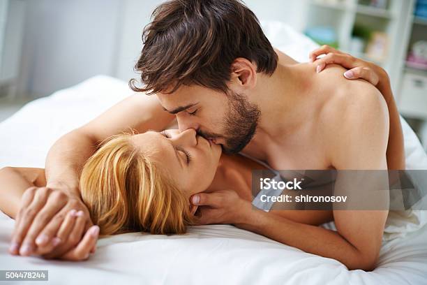 Couple Kissing Stock Photo - Download Image Now - Sex and Reproduction, Sexual Issues, Couple - Relationship