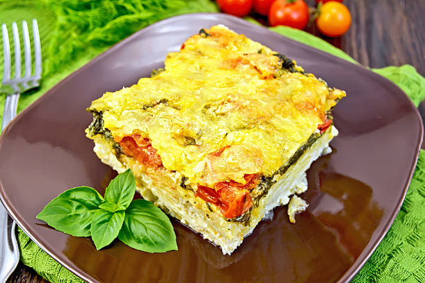 istock Pie potato with tomato and basil on board 504481632