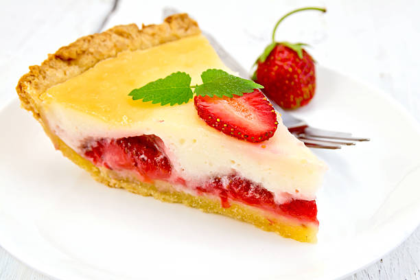 istock Pie strawberry with sour cream on light  board 504481772