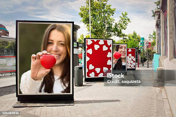 Love Billboards Photographs Of A Woman With Red Heart Stock Photo - Download Image Now