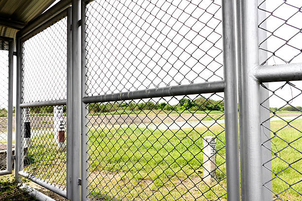 istock Wire fence field on background 504484159