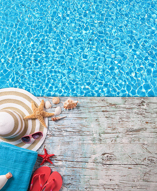 istock Summer accessories on wooden planks 504484379