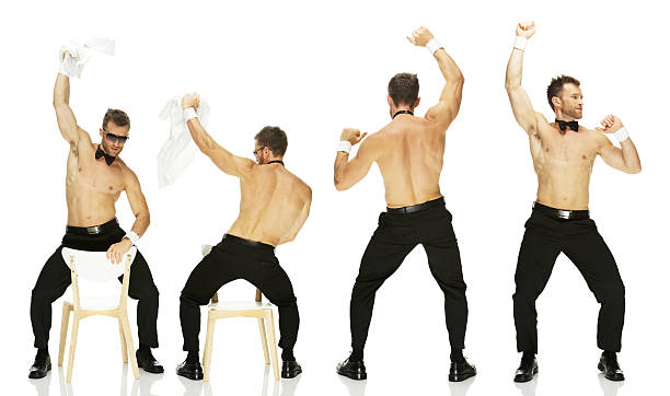 背面のストリッパダンス - male stripper ストックフォトと画像