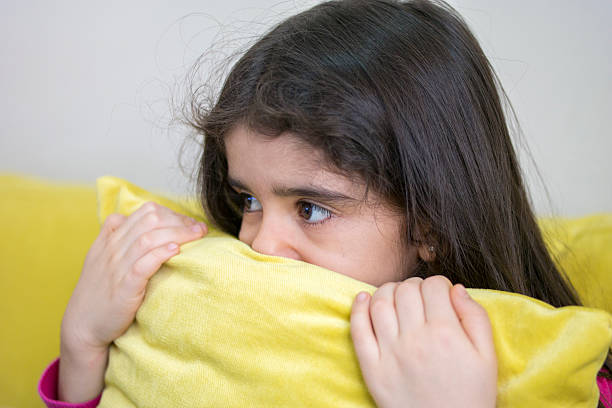 istock Little Girl Watching TV 504485142