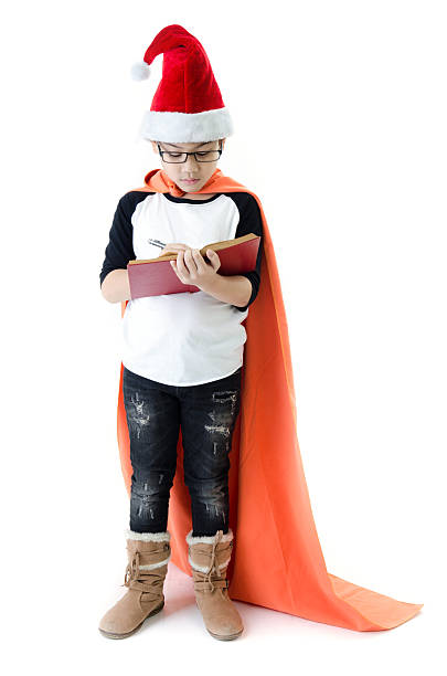 istock Little asian smile boy with santa hat 504485437