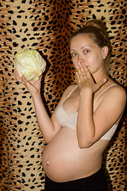 istock baby in the belly expectant mother 504485504