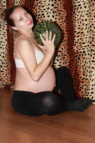 istock baby in the belly expectant mother 504485614