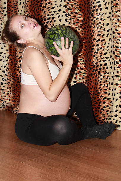 istock baby in the belly expectant mother 504485682