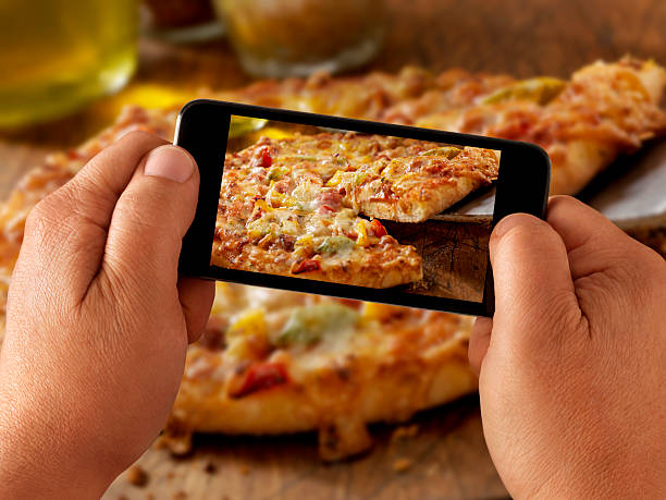 istock Mobile Photography of a Fully loaded Pizza 504488794
