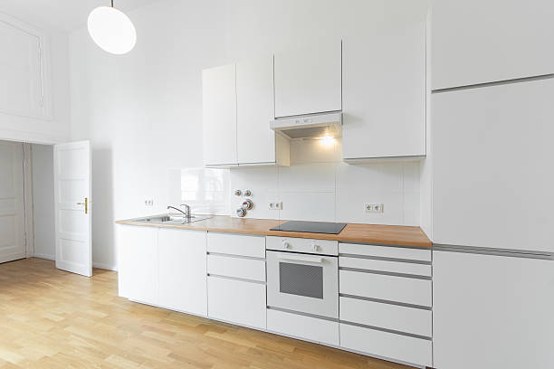 istock white kitchen, fresh renovated flat with wooden floor, 504488972