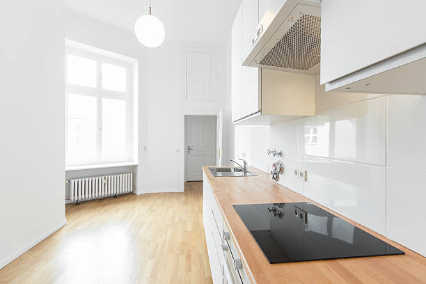 istock empty room, fresh renovated flat with wooden floor, 504489096