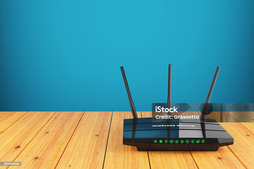 Wi-Fi wireless router on wooden table Wi-Fi wireless router on wooden table 3d Router Stock Photo