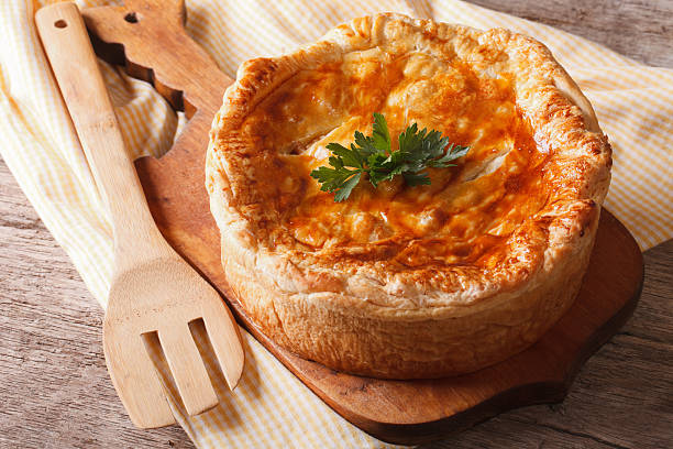 istock Homemade delicious chicken pie close-up. horizontal 504490978