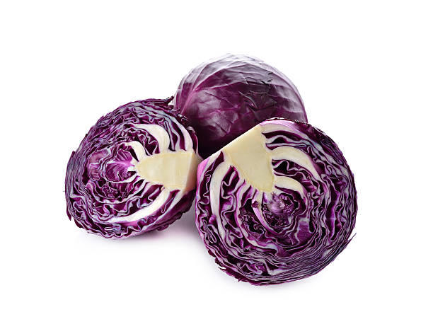 istock whole and half cut fresh red cabbage on white background 504491544