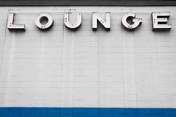 istock old retro lounge sign on building exterior 504491834