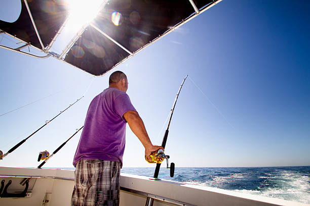 istock Fisherman on a boat in the ocean 504508469