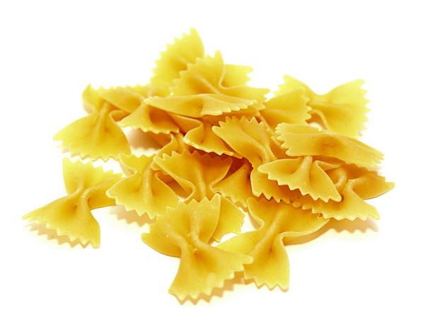 istock Raw Italian pasta ​​from durum wheat on a white background 504510383