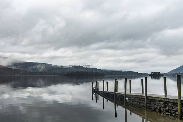 istock Cloudy Sky With Mist Over Mountains At Derwentwater Lake. 504522194
