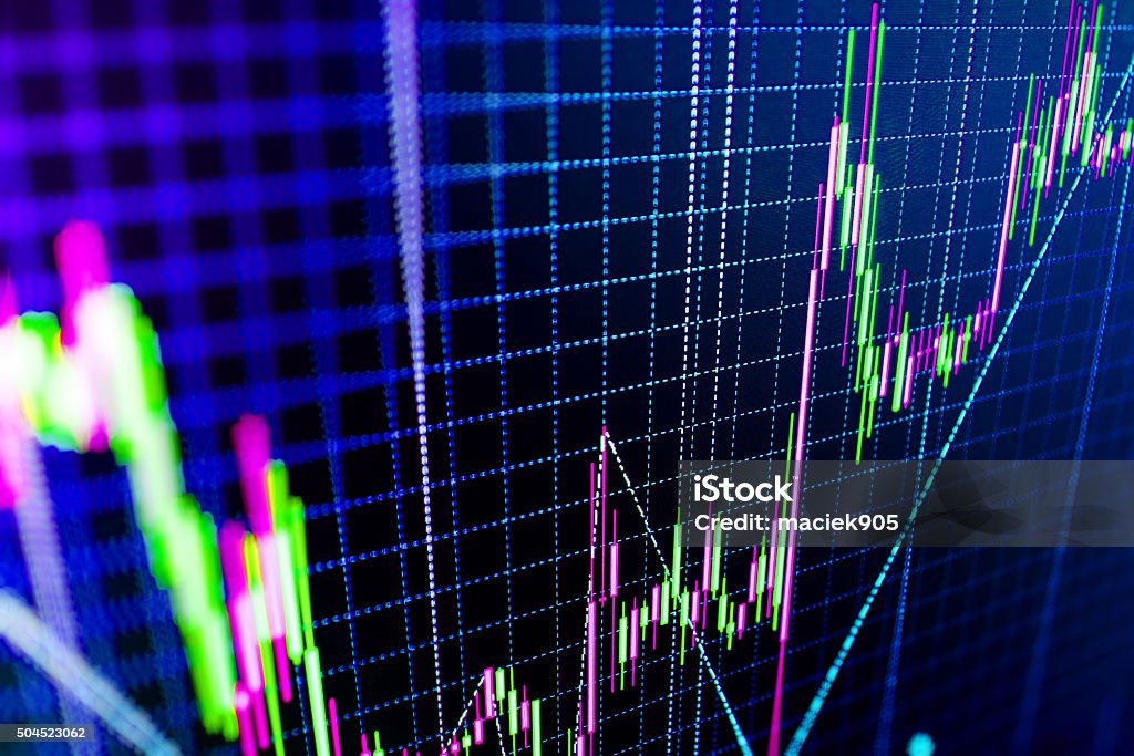 Stock market graph and bar chart price display Stock market graph and bar chart price display. Data on live computer screen. Display of quotes pricing graph visualization. Abstract financial background trade colorful Stock exchange trade chart bar candles macro close-up. Shallow depth of field effect. Screen shows stock price rates live. Stock market quotes diagram on monitor. Stock Market and Exchange Stock Photo