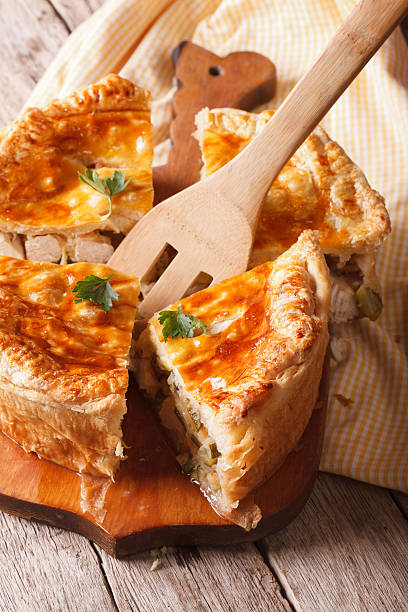 istock sliced chicken pie with zucchini closeup on the table. vertical 504523716