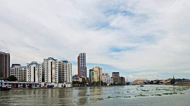 istock Modern City Near a River Panorama 504523890