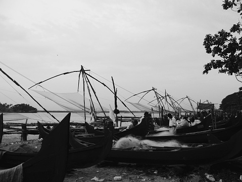 Black an white image of Chinese fishing nets at Cochin India