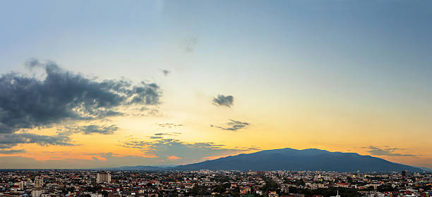 istock City and mountain in evening 504525986