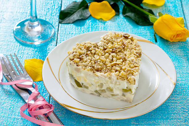 istock Salad with walnuts and meat on Valentine's Day. 504526292