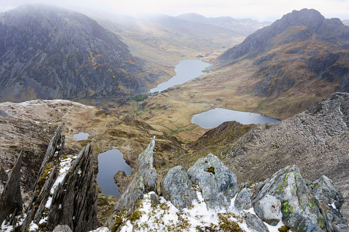 High view above Ogwen valley with Llyn Ogwen, Llyn Idwal and Llyn Clyd from rocky summit of Y Garn mountain in Snowdonia, Gwynedd, North Wales, UK, Great Britain, Europe