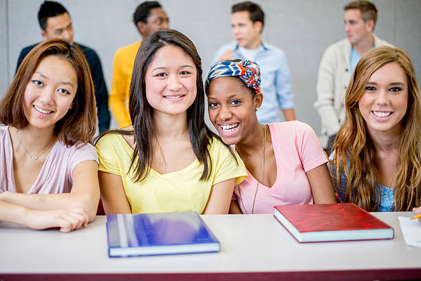 istock Friends Sitting Together in Class 504527448
