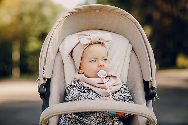 istock young family walking in the park 504529354