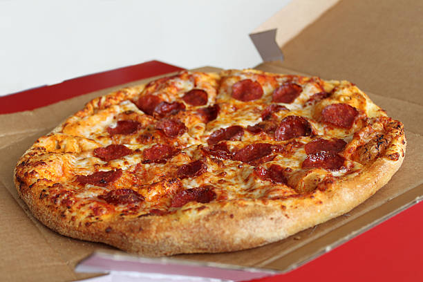 istock Pepperoni Pizza in Carton Isolated 504530054