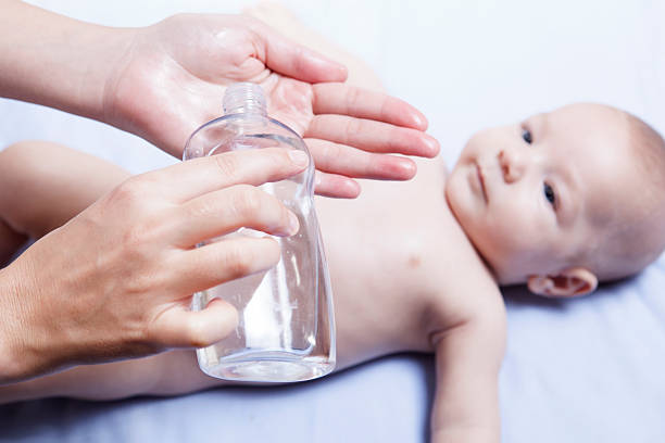 istock Recently cleaned baby ready for oil 504530606