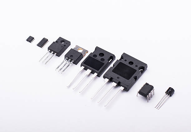 различных электронных компоненты - transistor стоковые фото и изображения