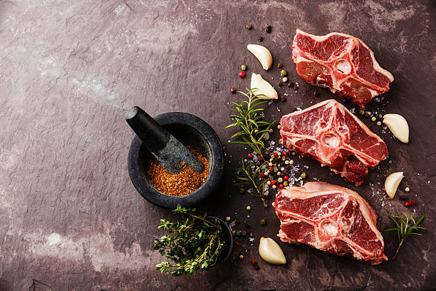 istock Raw fresh lamb loin chops with herbs and spices 504533936